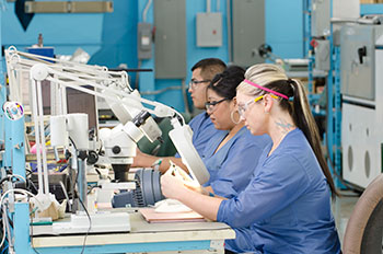 Photo of assembly workers.